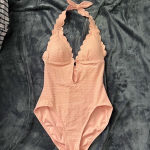 Gorgeous light pink Kate Spade swimsuit with scalloped detail